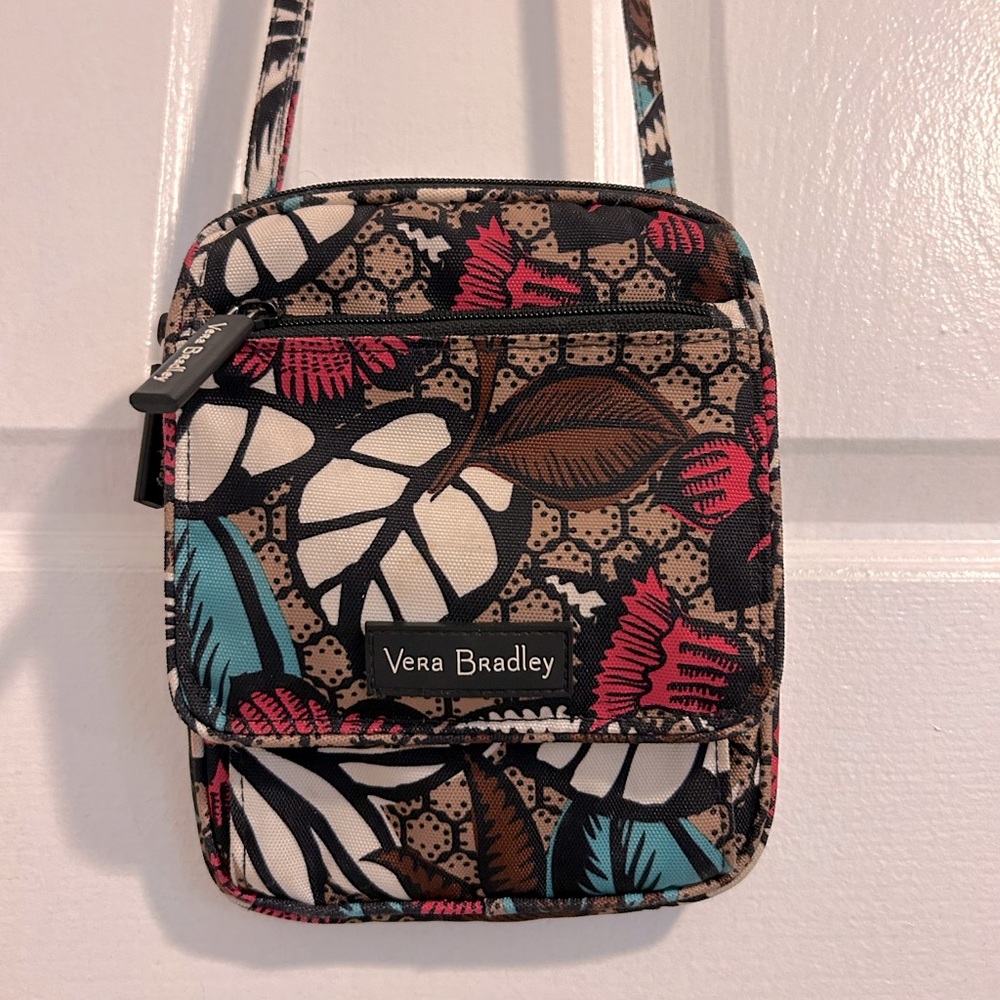 Vera Bradley nylon crossbody purse. Black, pink, teal and tan floral pattern.